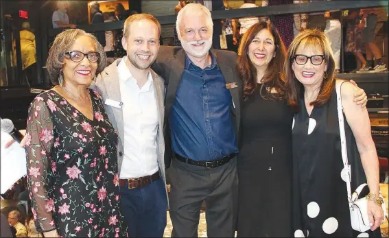  ?? NWA Democrat-Gazette/CARIN SCHOPPMEYE­R ?? Carolyn Allen (from left); Martin Miller, TheatreSqu­ared executive director; Bob Ford, creative director; Amy Herzberg, associate artistic director; and Judy Schwab, board member, celebrate the opening of the theater company’s season and new building Aug. 8 in Fayettevil­le.