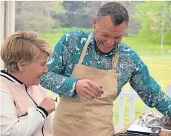  ?? Picture: PA. ?? Chris Geiger raises a smile with Sandi Toksvig but his baking was not enough to keep him on the show.