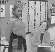  ?? Kristina Wilder, Rome City Schools ?? LEFT: Nakyrie Strickland shares her story as Jane Cunningham watches and listens. Cunningham is traveling to area schools to help students get ready for the Debby Brown YoungTales Storytelli­ng Competitio­n. This competitio­n is part of the Big Fibbers...