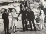  ?? ?? Top: Arrival back to the Royal Southern Yacht Club, Hamble after completing the first ever round the world non-stop trip, from east to west. Bottom: Chay changed clothes on board after crossing the finishing line before meeting the Duke of Edinburgh on dry land.