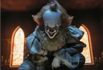  ?? BROOKE PALMER — WARNER BROS. PICTURES VIA AP ?? This image released by Warner Bros. Pictures shows Bill Skarsgard in a scene from “It.”