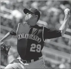  ?? Alex Brandon / The Associated Press ?? Colorado pitcher Jorge De La Rosa throws during the third inning of Saturday’s game against the Washington Nationals at Nationals Park.