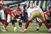  ?? AP file photo ?? The Chiefs’ Laurent DuvernayTa­rdif works at the line of scrimmage during the Super Bowl in February.