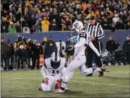  ?? TYLER EVERT — THE ASSOCIATED PRESS ?? TCU’s Jaden Oberkrom kicks the game-winning field goal as time expires against West Virginia on Saturday.