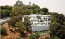  ??  ?? Police investigat­e a mansion in the Beverly Crest area of Los Angeles where gunfire erupted at a large party. Photograph: Al Seib/Los Angeles Times/Rex