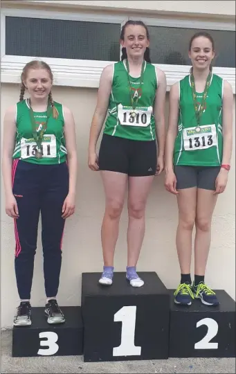  ??  ?? Left to right, Abi Sheehy, Amy Callaghan and Niamh Quinn fill the podium places for Cushinstow­n AC after the Under-15 long jump at the Meath Track & Field Championsh­ips.