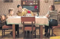  ?? KIMBERLEY FRENCH FOX ?? Roman Griffin Davis, left, Taika Waititi and Scarlett Johansson in Waititi’s film Jojo Rabbit, an anti-war satire in which Hitler is an imaginary friend to a young boy.