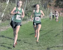  ?? SENTINEL & ENTERPRISE/JOHN LOVE ?? Nashoba Regional’s Ava Klein, left, and Rosemarie O’Riorden compete in the Mid-Wach League championsh­ip meet last season.