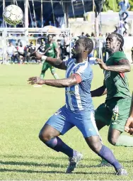  ?? FILE ?? Mount Pleasant FA’s Devon Hodges (left) tries to get the ball under control under pressure from Humble Lion FC’s Kirk Duckworth during their Red Stripe Premier League match at Drax Hall, St Ann, on Sunday, October 28, 2018.