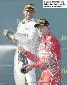  ??  ?? > Lewis Hamilton and Sebastian Vettel on the podium in Australia