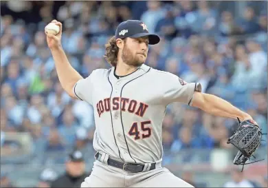  ?? Ap-frank Franklin II ?? Houston Astros starting pitcher Gerrit Cole (45) delivers against the New York Yankees during the first inning of Game 3 of baseball’s American League Championsh­ip Series on Tuesday in New York.