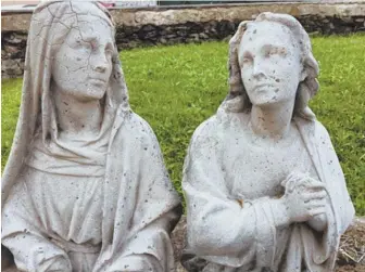  ?? PHOTO COURTESY OF RAY FLYNN ?? FROM THE SOUL: Statuary at St. Augustine’s Cemetery was cleaned recently by people devoted to their faith.