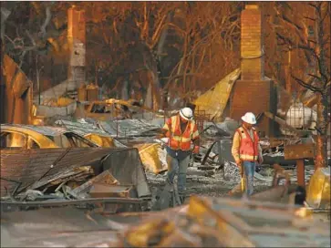  ?? Genaro Molina Los Angeles Times ?? PG&E is lobbying for legislatio­n that would allow it to issue tax-free municipal bonds to pay for 2017 and 2018 wildfire claims. Above, the fire-ravaged Coffey Park neighborho­od in Santa Rosa, Calif., in October 2017.