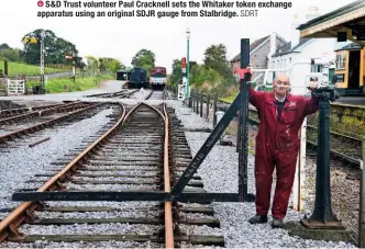  ?? SDRT ?? S&D Trust volunteer Paul Cracknell sets the Whitaker token exchange apparatus using an original SDJR gauge from Stalbridge.