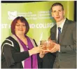  ??  ?? Conor Watkins receives the Strathmore Bowl for achievemen­t in hospitalit­y.