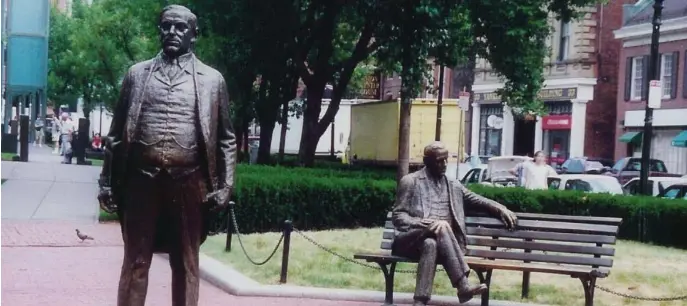  ?? FILE PHOTO ?? DOUBLE VISION: Boston’s Curley Memorial Plaza, at the intersecti­on of Congress and North streets, features a pair of statues of James Michael Curley.