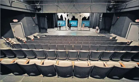  ?? [KYLE ROBERTSON/DISPATCH] ?? Members of the stage crew set up for “Ulmus Ohioana,” the final play of the 2016-17 school year at Denison.