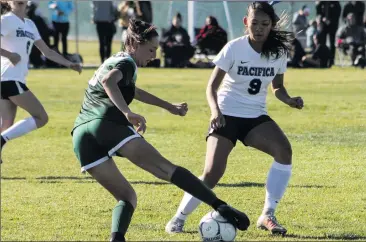  ?? Haley Sawyer
/The Signal ?? Cowboys defender Madison Jackson (29) heads the ball in a game against Pacifica on Friday. (Right) Analise Rappe (left), a midfielder for Canyon, reaches for the ball as a Warriors player looks on.