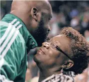 ?? ELSA/GETTY ?? Shaquille O’Neal hugs his mother, Lucille O’Neal, before a
2011 NBA playoff game in Boston. Lucille O’Neal has been named godmother of the transforme­d Carnival Radiance.