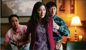  ?? Allyson Riggs / Associated Press ?? Stephanie Hsu, Michelle Yeoh and Ke Huy Quan in a scene from, “Everything Everywhere All At Once.”