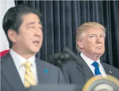  ??  ?? ALL EARS: President Donald Trump looks on as Japanese Prime Minister Shinzo Abe speaks at a news conference at the Mar-a-Lago resort in Palm Beach, Feb 11, 2017.