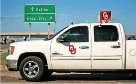  ?? [PHOTO BY CHRIS LANDSBERGE­R, THE OKLAHOMAN] ?? University of Oklahoma fans make their way to Texas after OU fans gather for the Bevo Bash in Marietta.