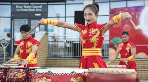  ??  ?? Musicians from the Shanghai Empireast Culture Group performing at the Chinese Autumn Festival at Bray Civic Plaza.