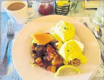  ?? ALICE BOURGET ?? Crab Benedict makes a luxurious Sunday brunch dish at Aptos’ Cafe Sparrow.