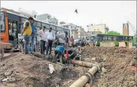  ?? SAUMYA KHANDELWAL/HT PHOTO ?? Leakage in this pipeline near Azad Market in north Delhi is causing water contaminat­ion. Residents said they sometimes get yellow water and have to depend on bottled water. Moving around is also a problem.