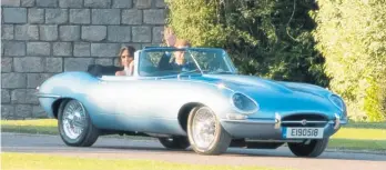  ?? Photos / Getty Images, Supplied ?? Neil Young, top, with his Lincvolt; Harry and Meghan’s wedding EV Jaguar, above; and Aston Martin’s EV conversion.