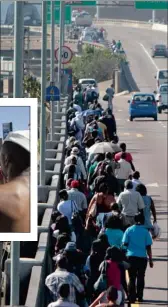  ?? Picture: S’BONELO NGCOBO ?? People walk to town from the old airport after being dropped by taxis on the freeway.