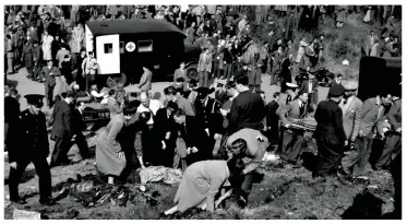  ?? ?? Devastatio­n: The wreckage on impact (top) and pilot John Derry (left), who died with flight observer Tony Richards. One engine crashed into the crowd (above) killing 29