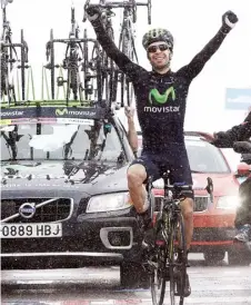  ??  ?? Above Giovanni Visconti celebrates his finest win amid some of the worst conditions the Giro has seen