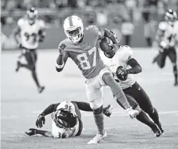  ?? DAVID SANTIAGO dsantiago@miamiheral­d.com ?? Dolphins wide receiver Isaiah Ford runs after a catch in Thursday’s 22-10 win against the Ravens. Ford finished with a season-high four catches for 84 yards.