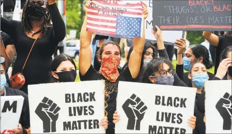  ?? Christian Abraham / Hearst Connecticu­t Media ?? Hundreds of demonstrat­ors assemble at Danbury City Hall to protest police brutality on Wednesday. The protest in Danbury was one of dozens held all over the country after the death of George Floyd in Minneapoli­s.