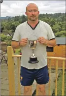  ??  ?? Ryan McGlynn with the trophy.