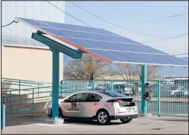  ??  ?? This solar charging station was installed at Sacred Power’s operations in Albuquerqu­e.