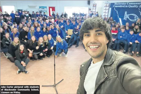  ?? ?? Jake Carter pictured with students of Blackwater Community School, Lismore on Friday.