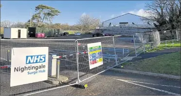  ?? Picture: Barry Goodwin ?? Ashford’s Nightingal­e ‘surge hub’ pictured on the William Harvey’s main car park yesterday (Wednesday) morning