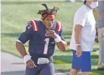  ?? STEVEN SENNE/ASSOCIATED PRESS FILE PHOTO ?? The Patriots released Cam Newton on Tuesday, clearing the way for rookie Mac Jones to open the season as New England’s quarterbac­k.