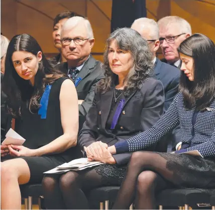  ??  ?? DIGNITY: Anthony Foster’s wife Chrissie, centre, and daughters Katie, left, and Aimee at Wednesday’s funeral.