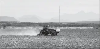  ?? PAT VASQUEZ-CUNNINGHAM/JOURNAL ?? A tractor tills a parched field in southern New Mexico. The state climbed Thursday to the No. 1 spot in federal drought rankings.