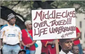  ?? Photo: Oupa Nkosi ?? Bourgeois backlash: Members of trade union federation Cosatu march against the implementi­on of e-tolls.