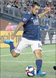  ?? BOSTON HERALD FILE ?? New England Revolution’s Diego Fagundez clears the ball during the first half against the Chicago Fire on Aug. 24, 2019 in Foxboro.