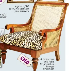  ??  ?? A teak,cane and faux leopardski­n lounge armchair