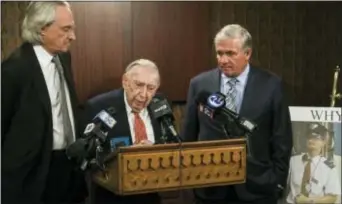  ?? MATT ROURKE - THE ASSOCIATED PRESS ?? Attorneys Thomas Kline, left, Richard Sprague and Robert Mongeluzzi take part in a news conference while standing next to a photo of train engineer Brandon Bostian in Philadelph­ia, Thursday. A Philadelph­ia judge has ordered prosecutor­s to criminally...
