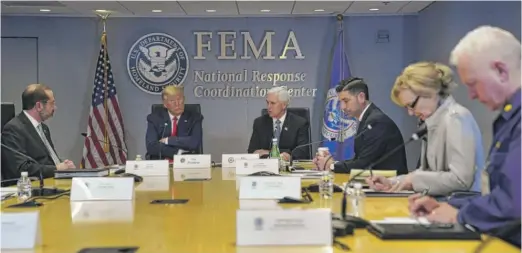  ?? EVAN VUCCI/AP, POOL ?? President Donald Trump attends a teleconfer­ence with governors at the FEMA headquarte­rs on Thursday in Washington.