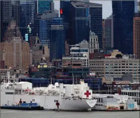  ?? REUTERS ?? The USNS hospital ship Comfort is seen docked at Pier 90 on Manhattan’s West Side during the outbreak of Covid-19 in New York City, New York, US, on Friday.
