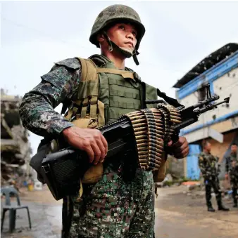  ?? Reuters/File ?? A soldier stands guard in Marawi City. The Philippine­s has faced several terror threats in the past years.