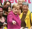  ?? Foto: dpa ?? Kanzlerin Angela Merkel beim 100 Jahre Frauenwahl­recht.Festakt